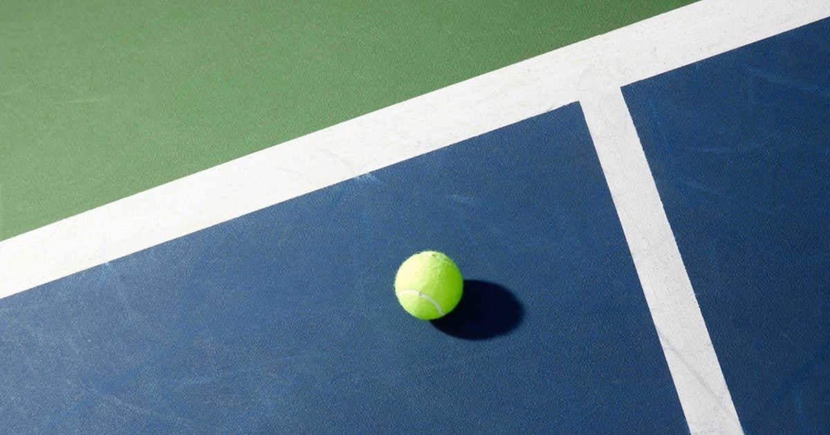 Three tennis players meeting on court and arranging a game with OnCourt